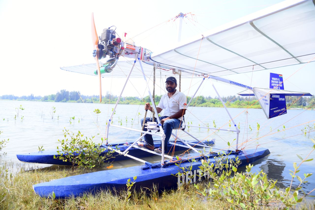 "Pushhpraj Shrinivas Ameenn sitting on Drithi, India's first indigenous single-seater microlight seaplane, designed and developed by Viyaddrony R&D."